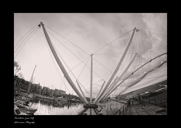 A3-sized black-and-white fine art print in copper tones of Renzo Piano’s Bigo in Genoa, an artistic photograph taken with a fisheye lens and a black border