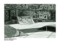 Artistic black-and-white photography that highlights the contrasts of street art in the urban landscape of Carbonia, Sardinia.