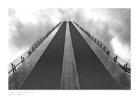 Fine art black-and-white photographic print of the Isozaki Tower in the CityLife district of Milan. A geometric framing from the side of the building that highlights its architectural lines. Artistic